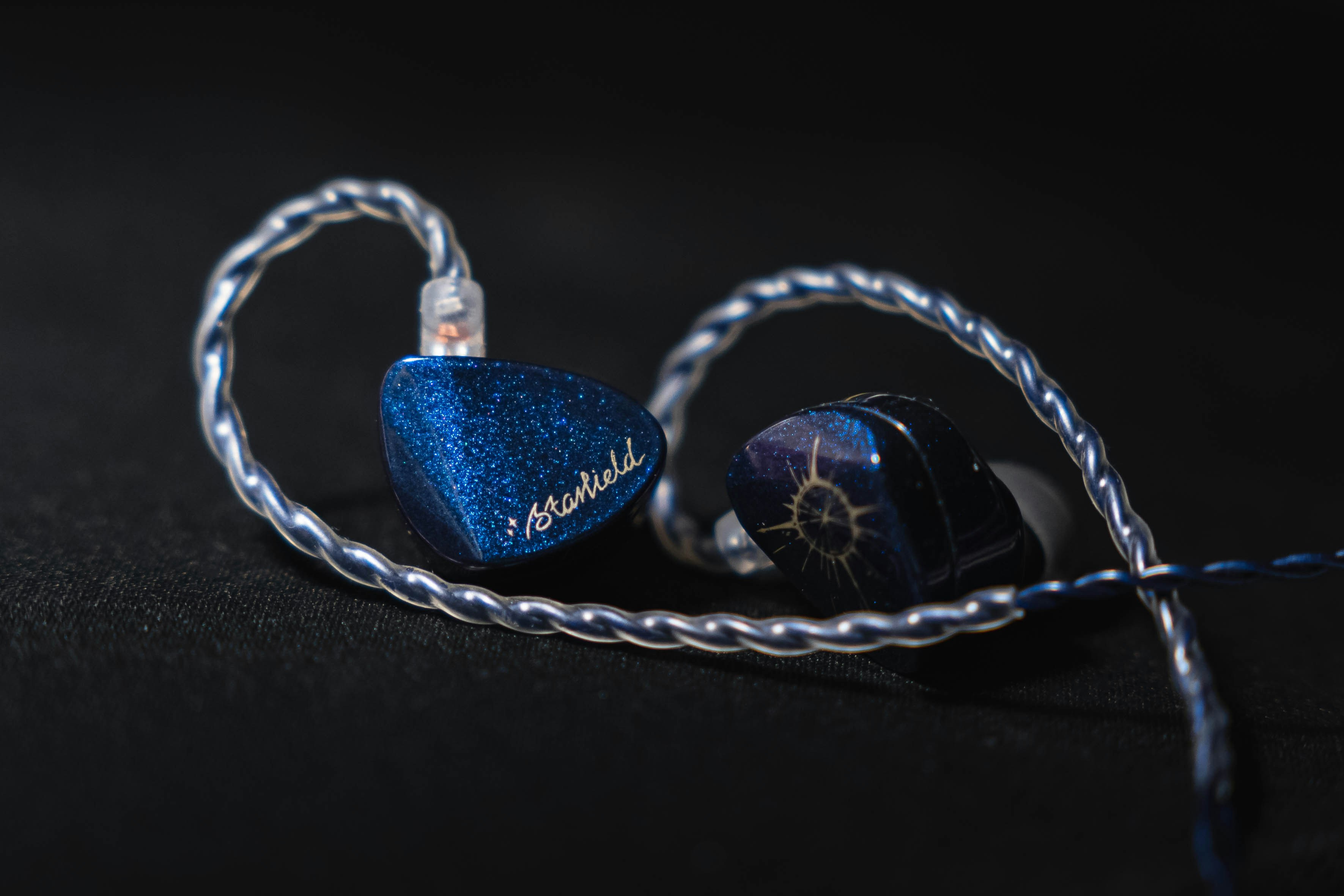 AJX Starfield custom in-ear monitors with cosmic blue flake shells